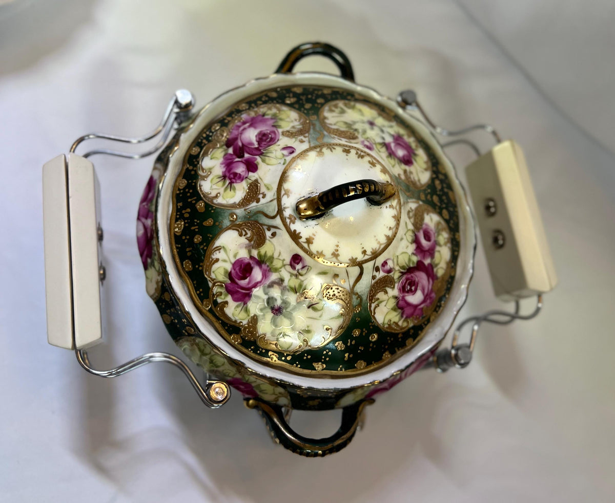 Expandable Casserole Transport and Trivet - Flowers on handles. Condition is "Used"